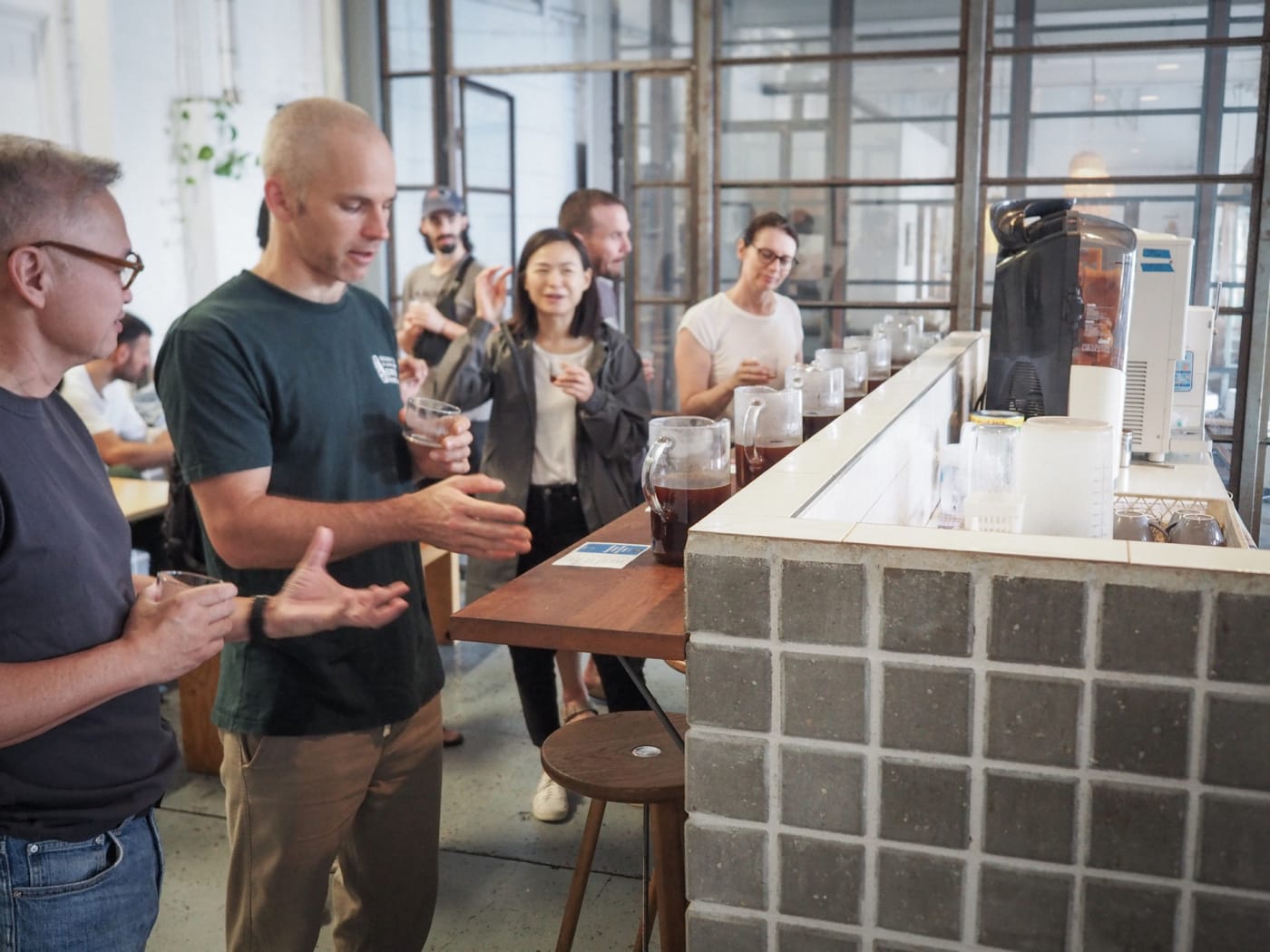 People tasting coffee at one of our Monthly Tasting Session in St Peters.